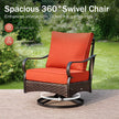 Spacious 360-degree swivel chair with orange cushions in a garden setting