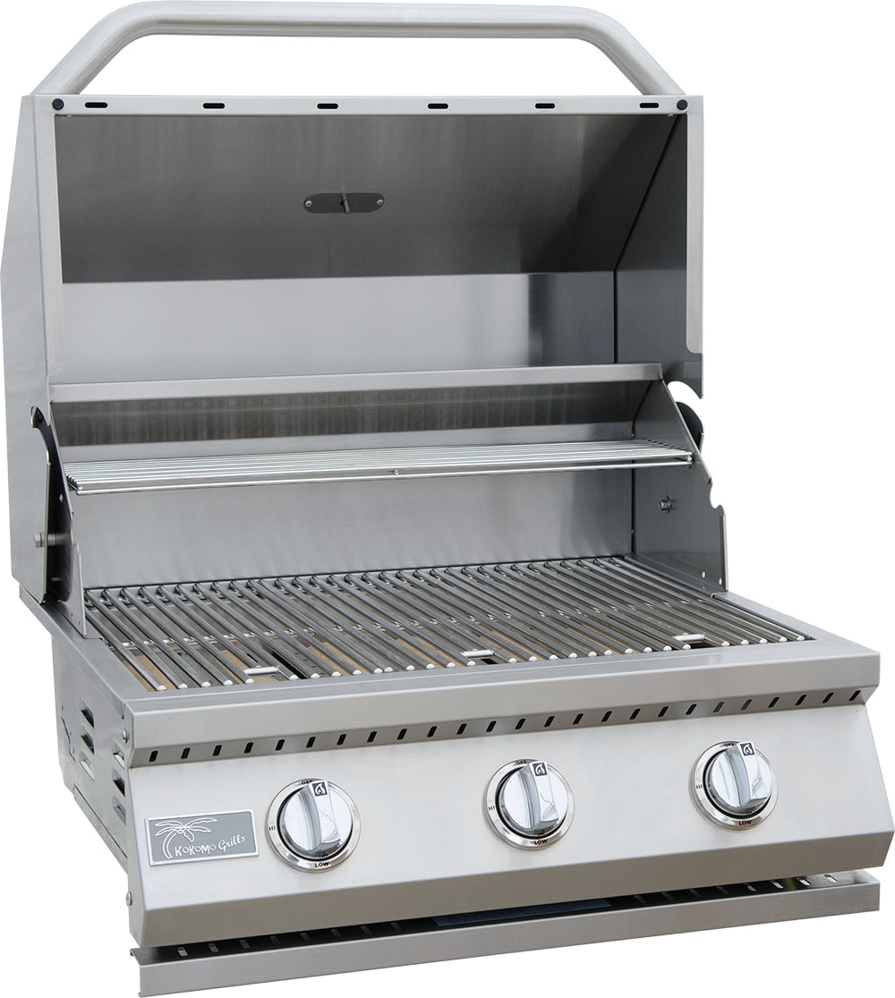 Stainless steel grill with three control knobs on a white background