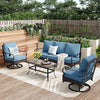 Outdoor patio set with blue cushions on a wooden deck