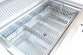 Empty freezer compartment with wire shelves