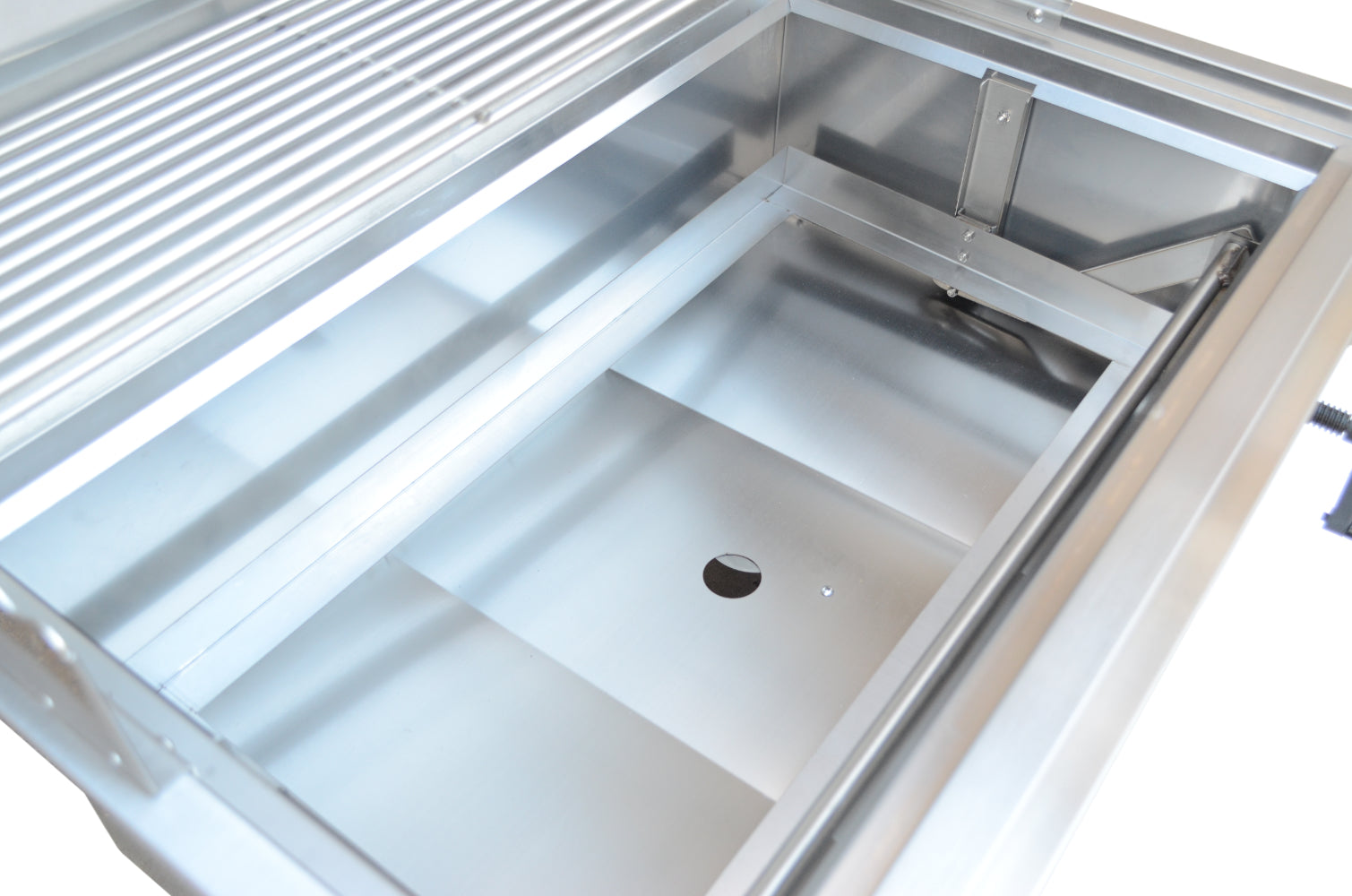 Stainless steel kitchen sink with a white background
