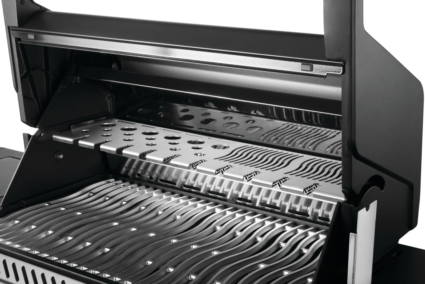 Close-up of a grill with open lid showing grates and branding.