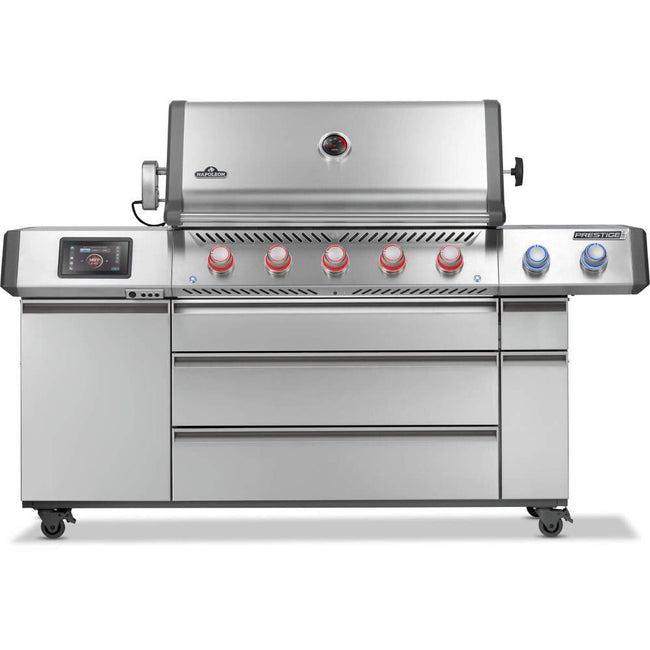 Stainless steel grill with multiple knobs on a white background