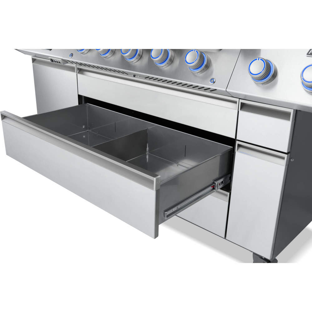 Stainless steel grill with a drawer open on a white background