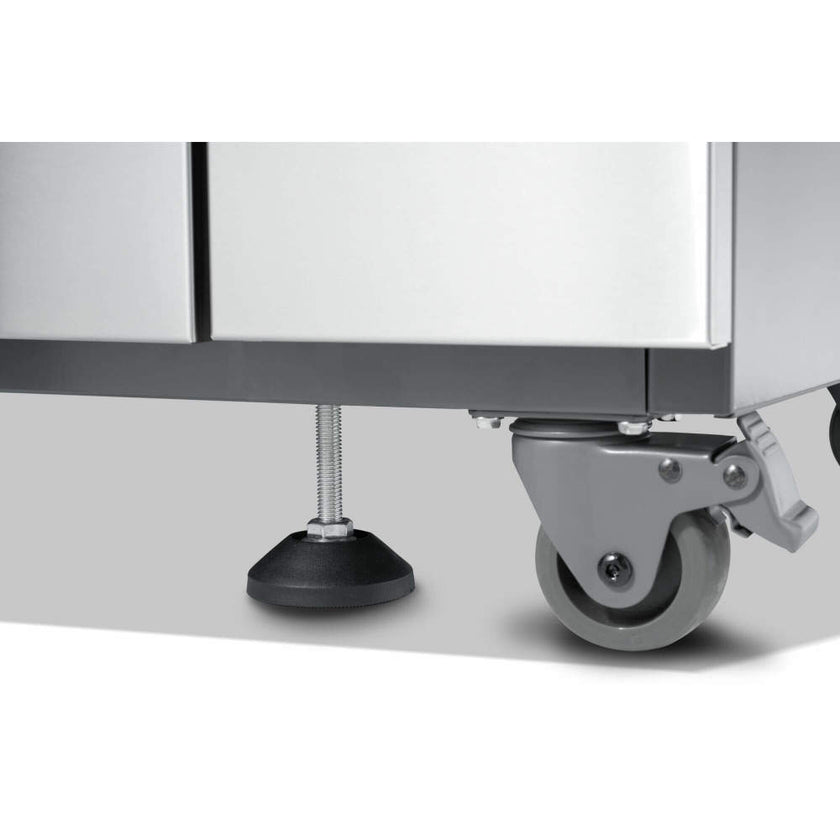 Close-up of a metal cabinet with wheels on a white background