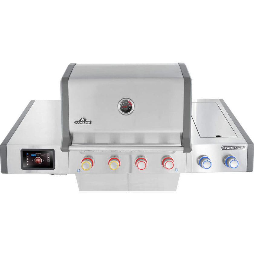 Stainless steel grill with digital display and control knobs on a white background