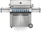 Stainless steel grill with multiple burners on a white background