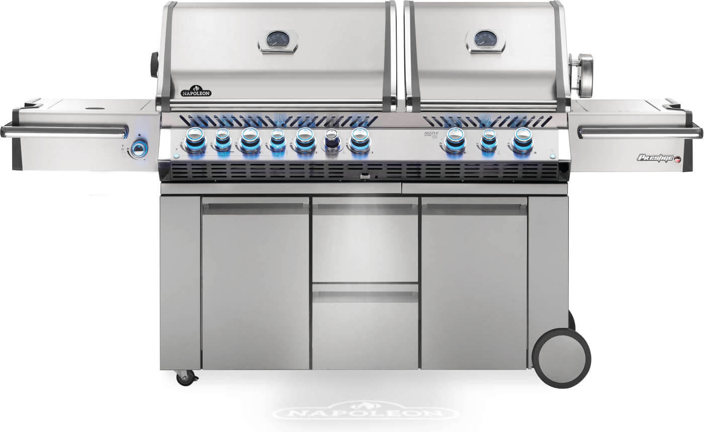 Stainless steel grill with multiple burners on a white background