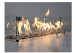 Modern ethanol fireplace with glass front and visible flames on a light background