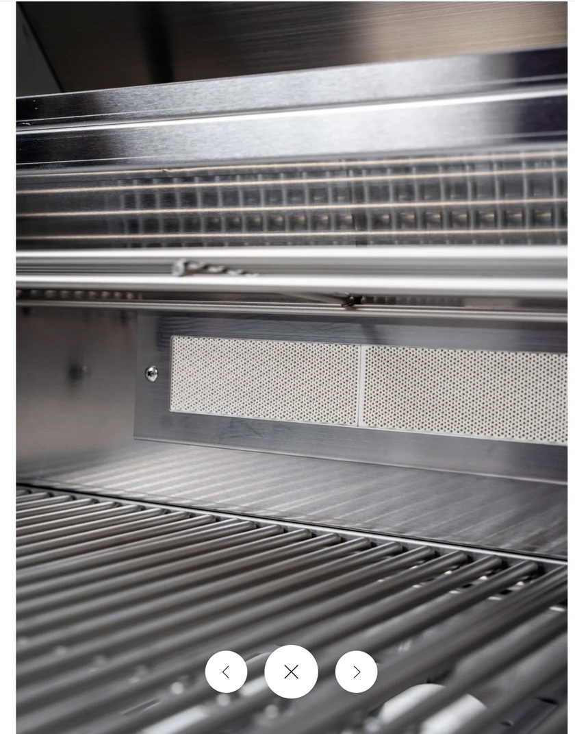 Close-up of a metallic grill with a textured surface