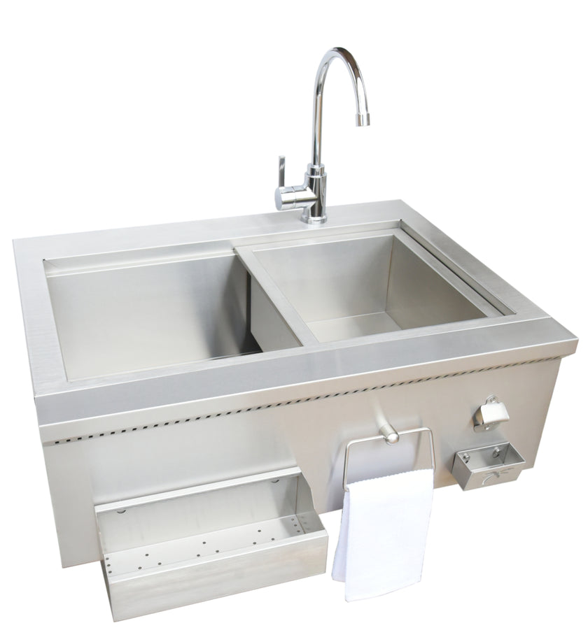 Stainless steel kitchen sink with faucet on a white background