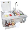 Outdoor kitchen island with sink, bottles, and food items on a white background