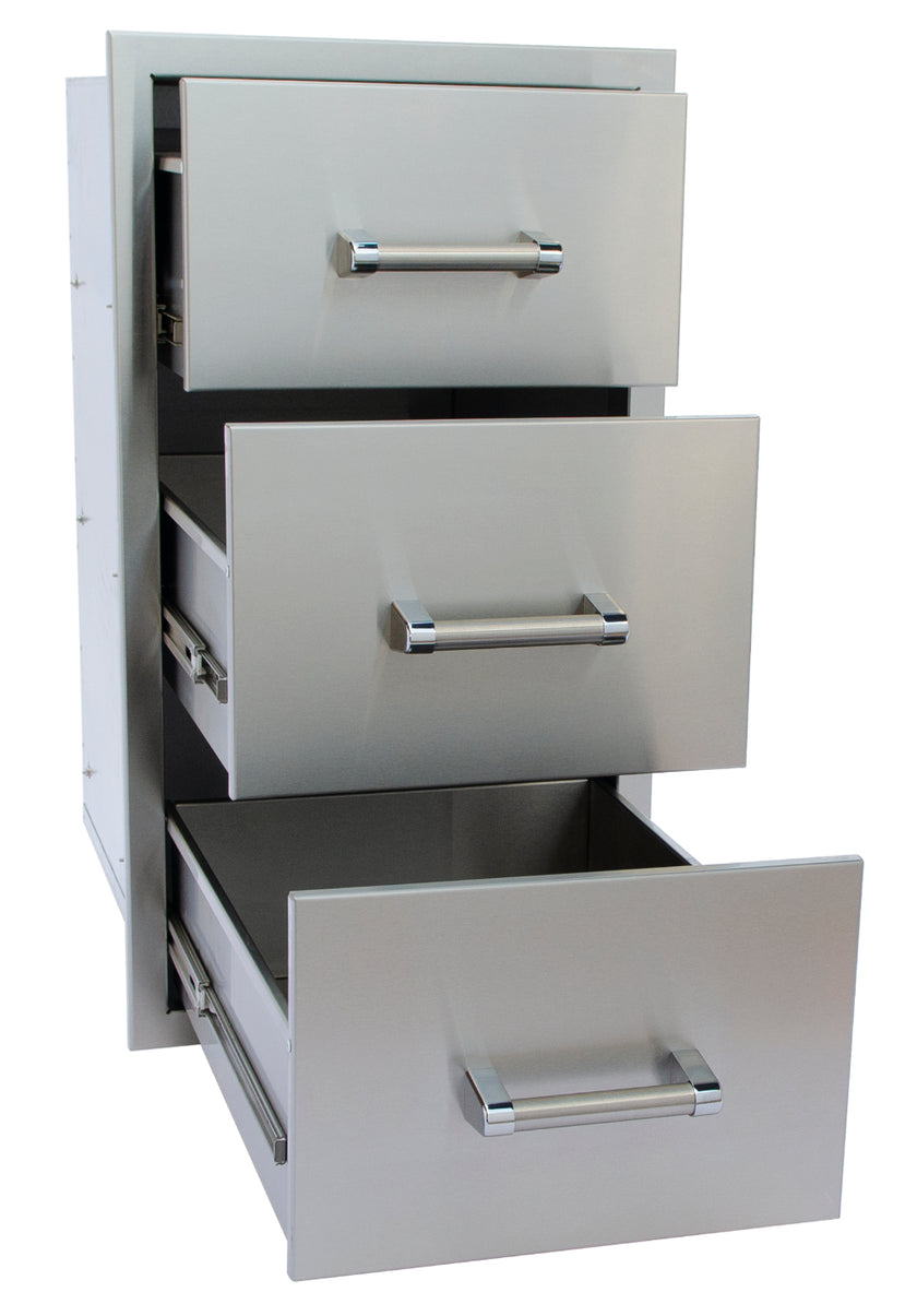Stainless steel outdoor kitchen drawer unit with three drawers on a white background
