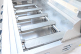 Close-up of a kitchen appliance with metallic shelves and 'Bosch' branding.
